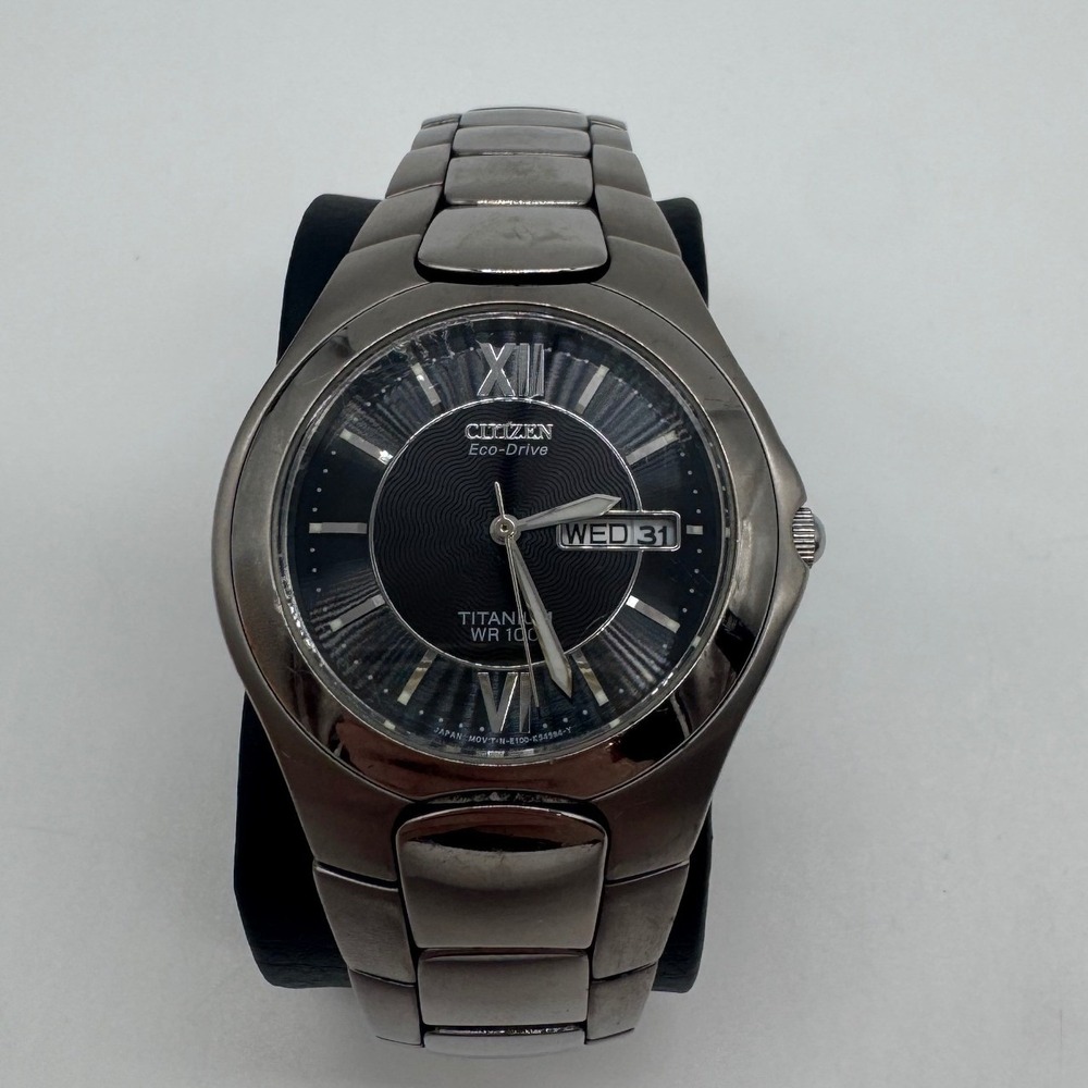 Citizen Eco-Drive Titanium WR 100 Mens Watch Grey E101-K18434 Black Dial